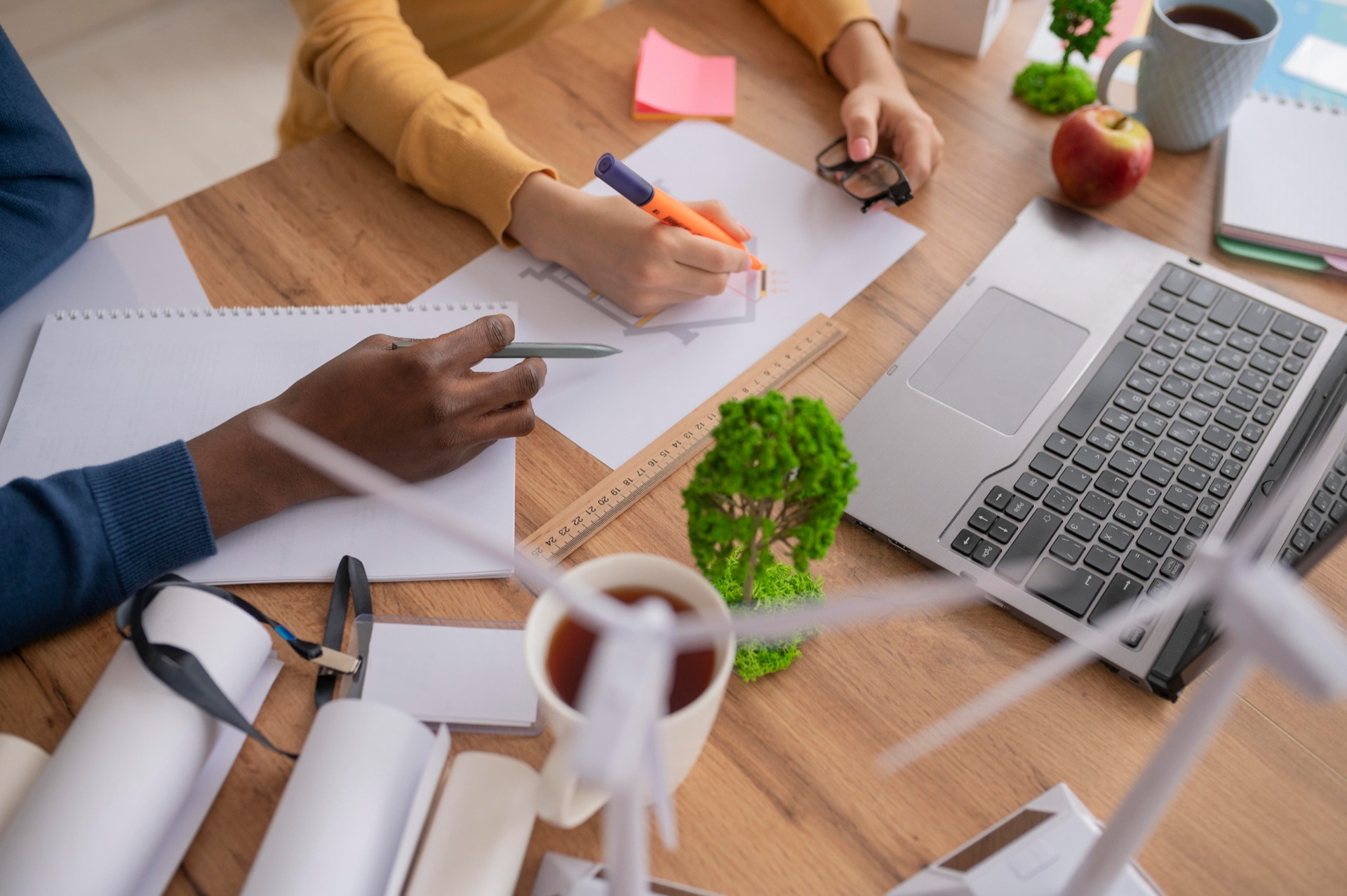 Colleagues working on documents together at a table