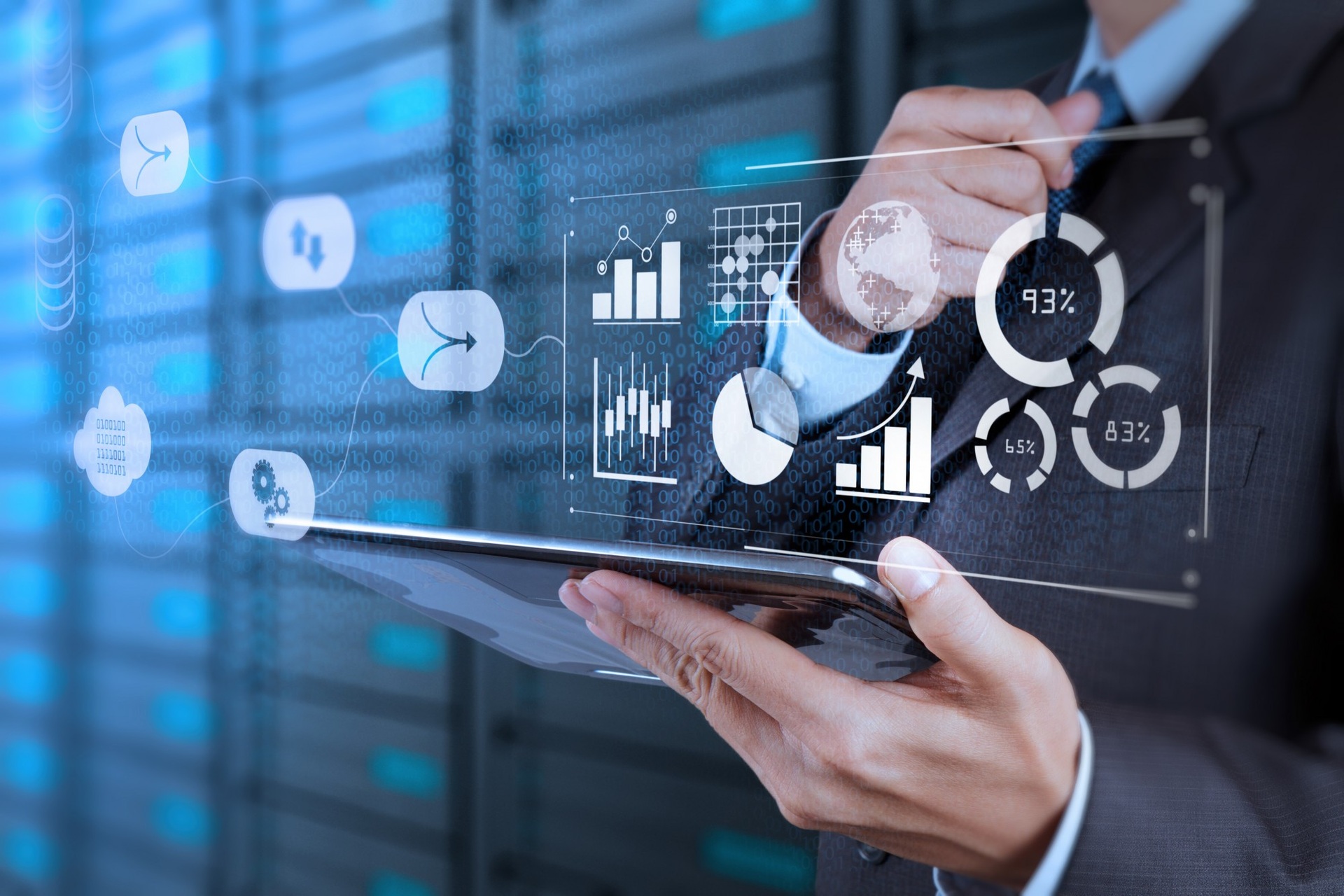 A tablet user with an overlaid digital data dashboard