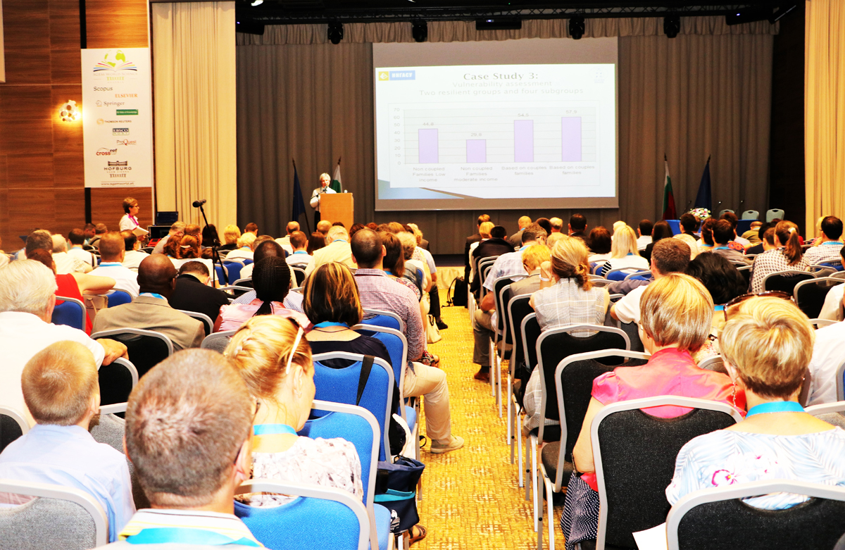 SGEM conference audience watching a projected presentation