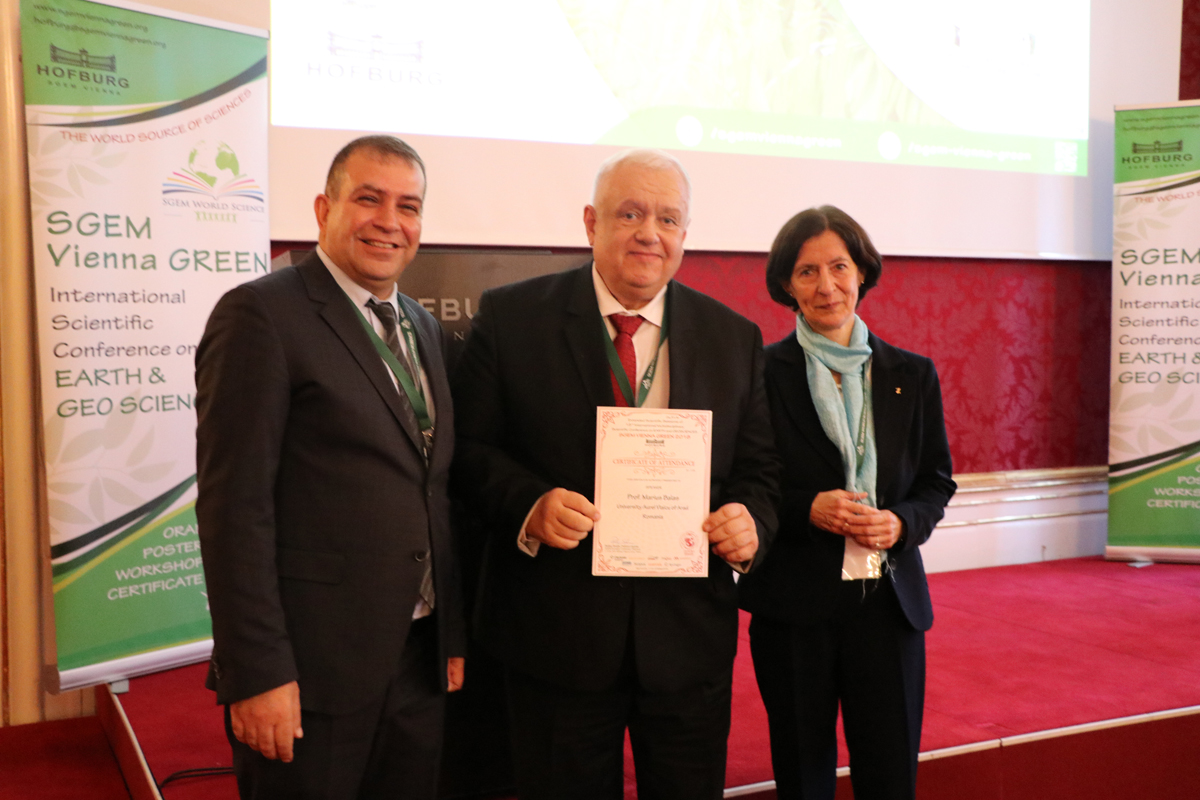 An SGEM Vienna GREEN certificate recipient with two colleagues