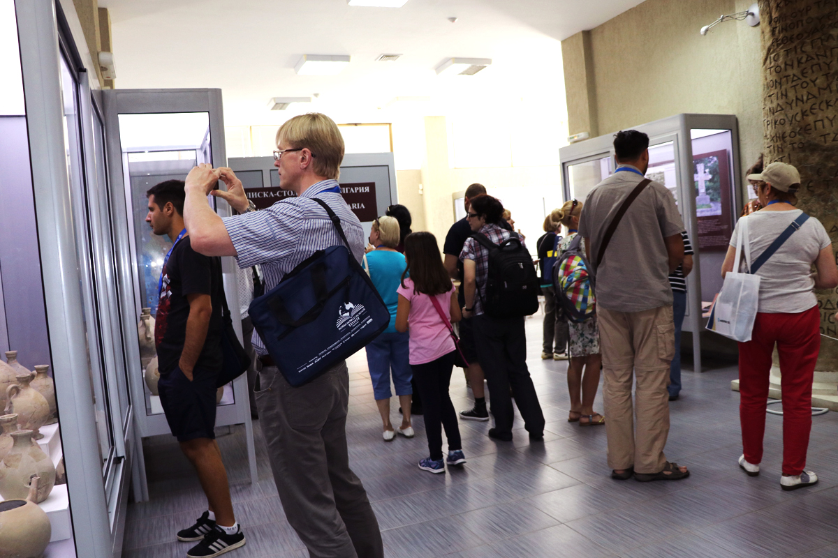 Delegates browsing an SGEM poster exhibition in a foyer