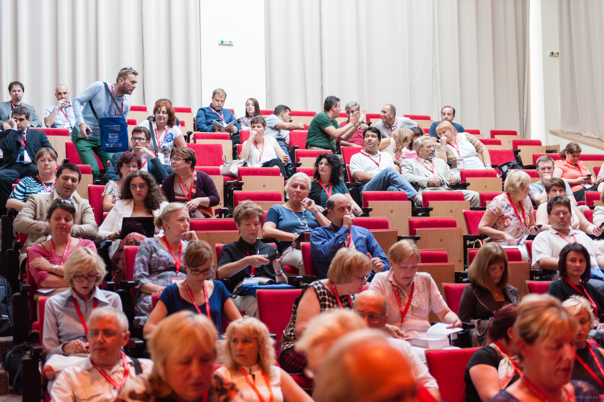 A full SGEM audience seated in a tiered auditorium