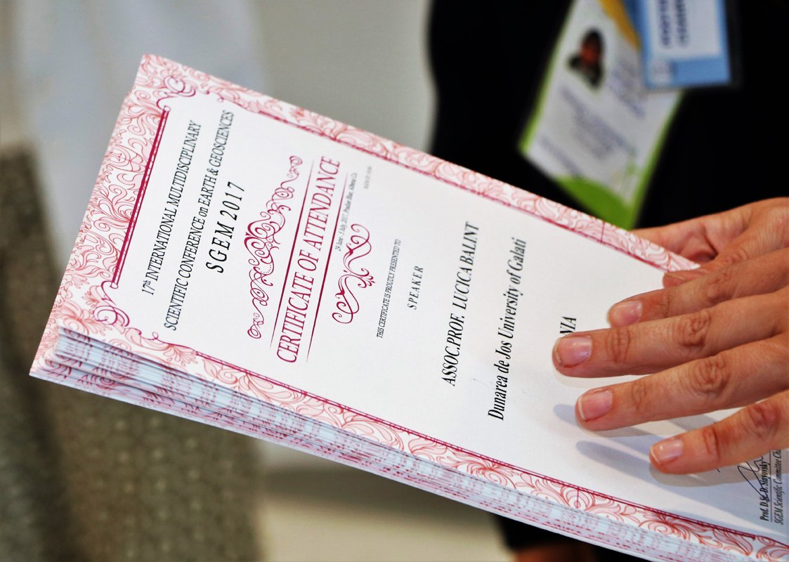 An SGEM certificate of attendance held in a participant's hands