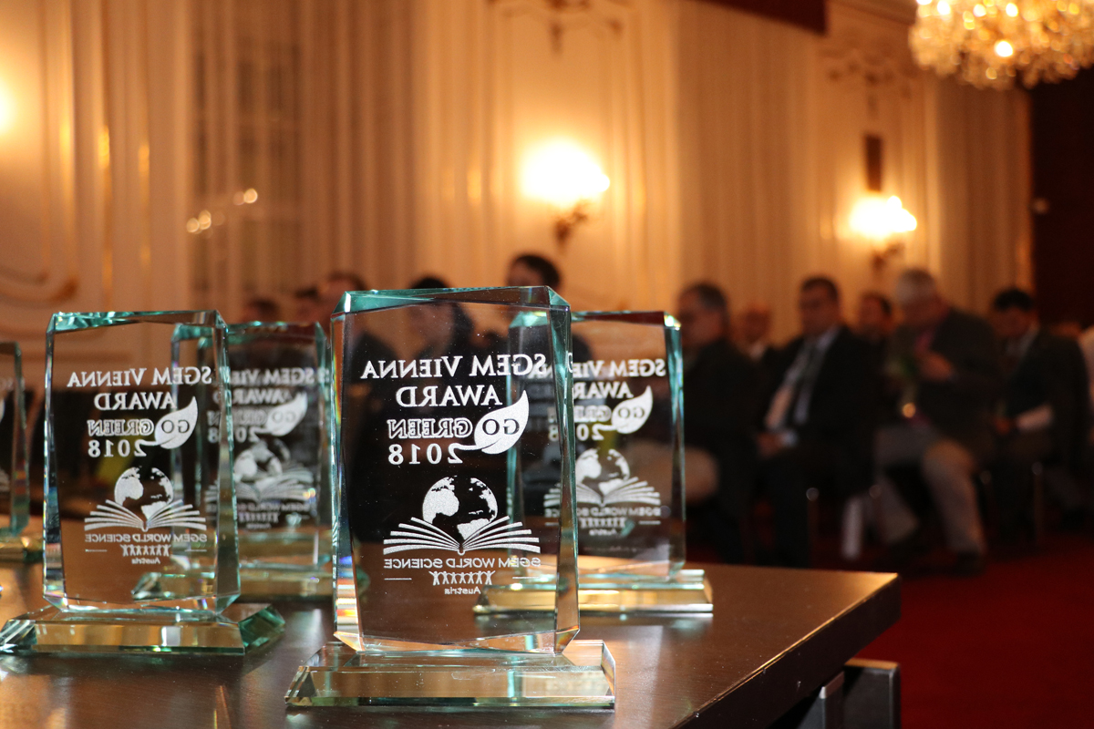 Glass SGEM awards on a table before a ceremony