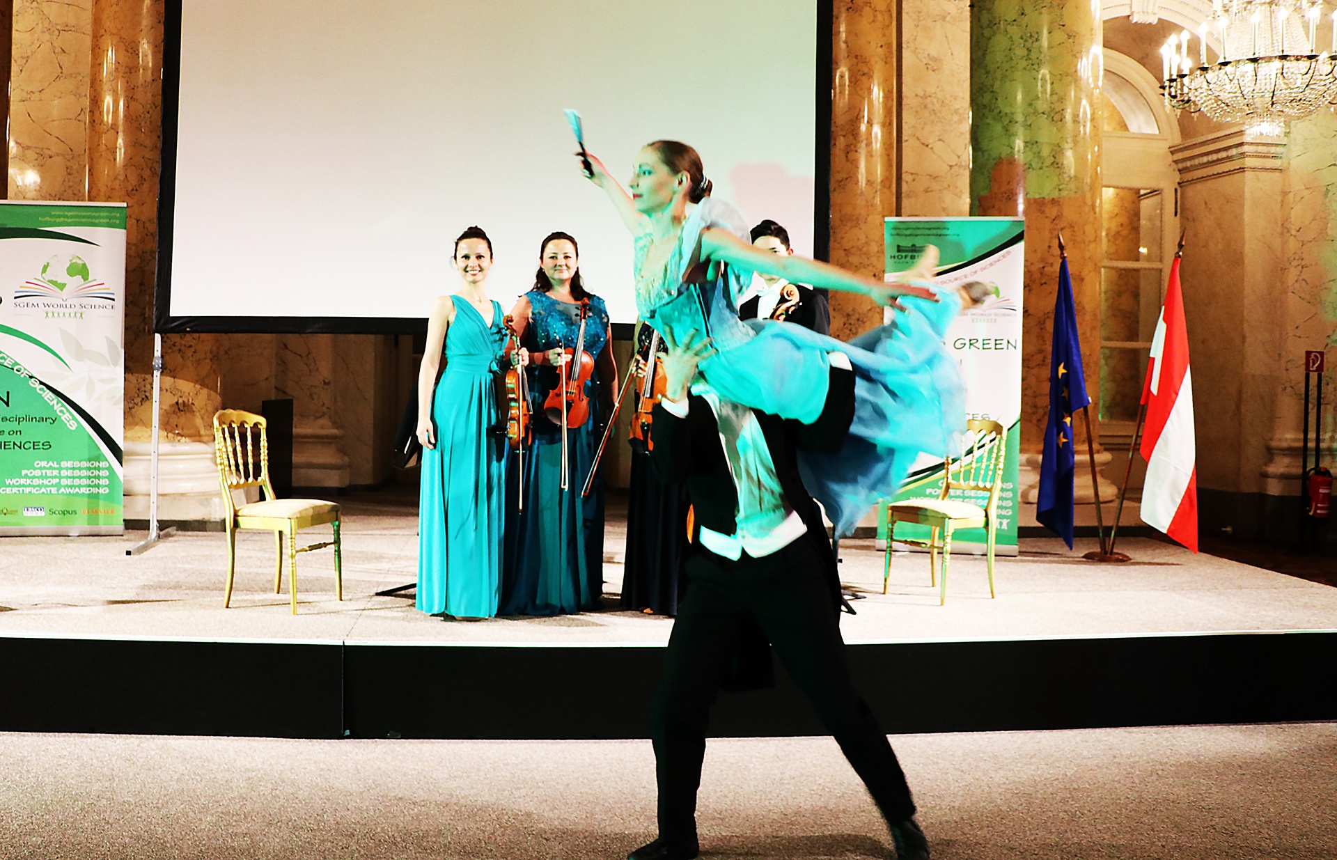 A dance performance before a string ensemble at an SGEM event