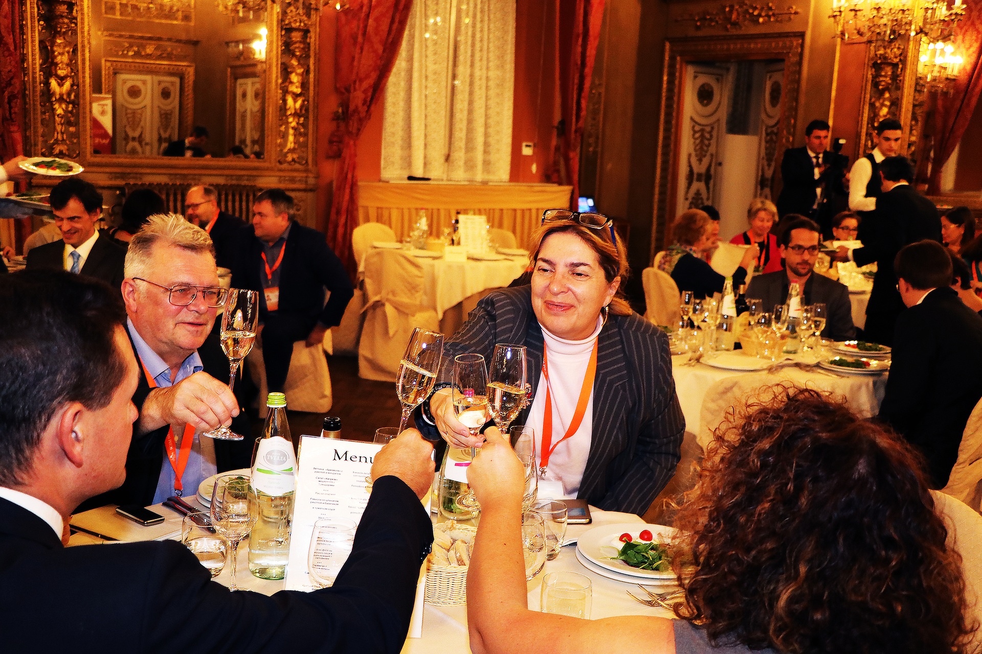Delegates sharing a conference dinner around a table