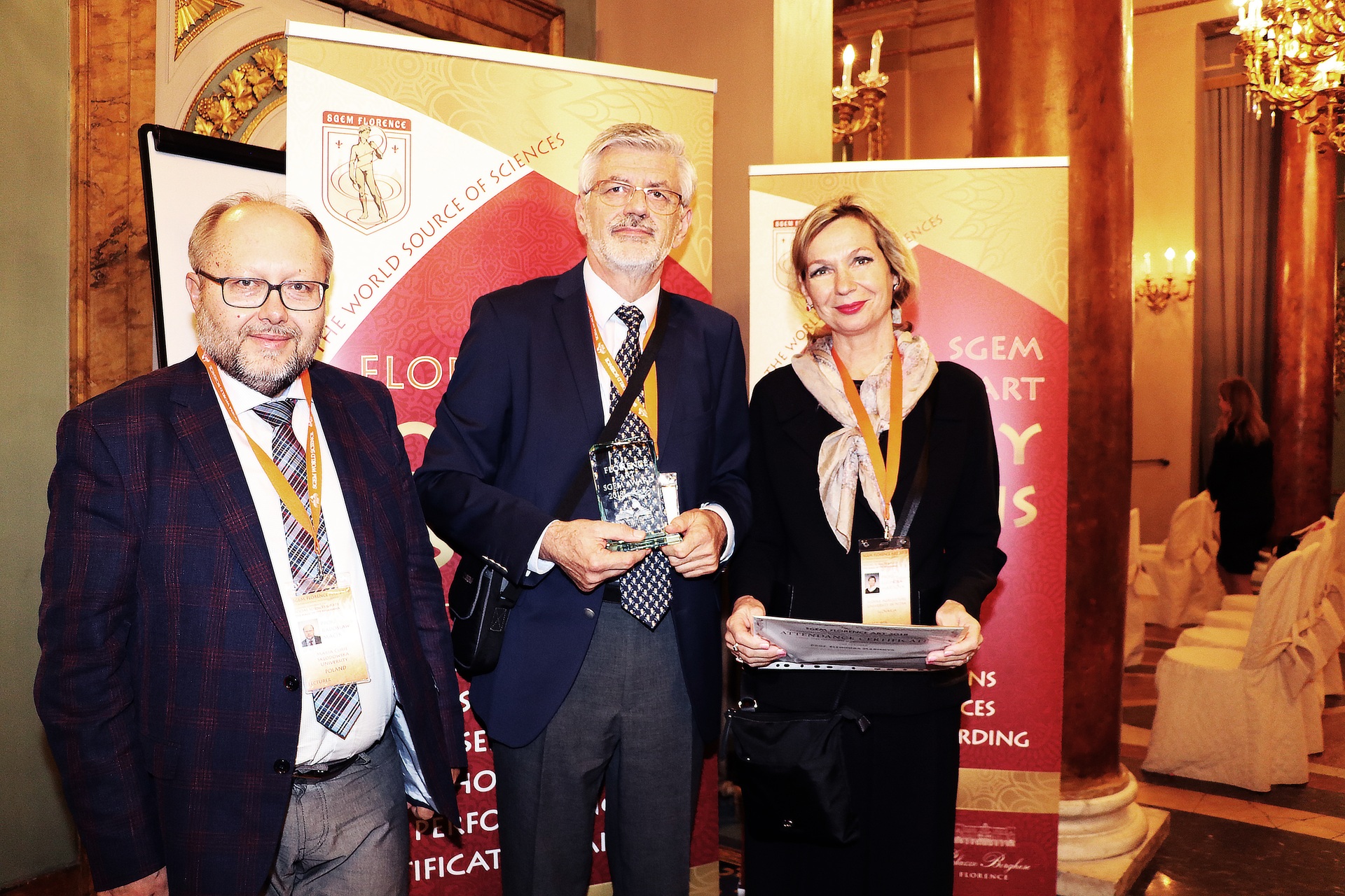 Three SGEM Florence Art delegates posing with awards