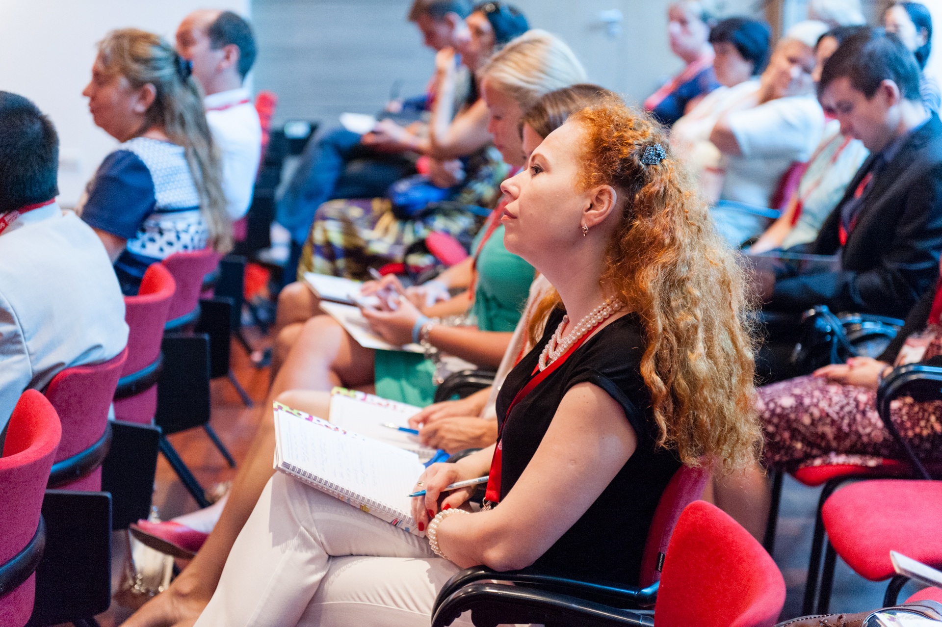 A delegate taking notes during an SGEM session