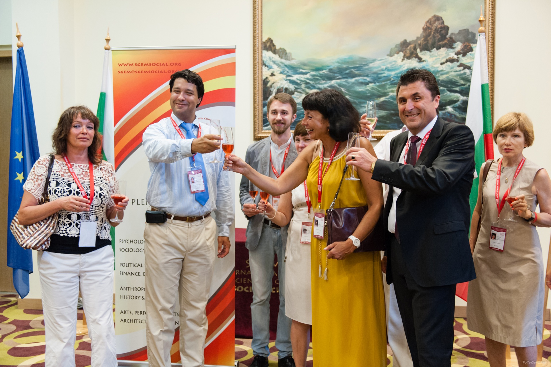 SGEM delegates sharing a toast at a reception